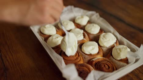 freshly baked cinnamon rolls with cream cheese frosting