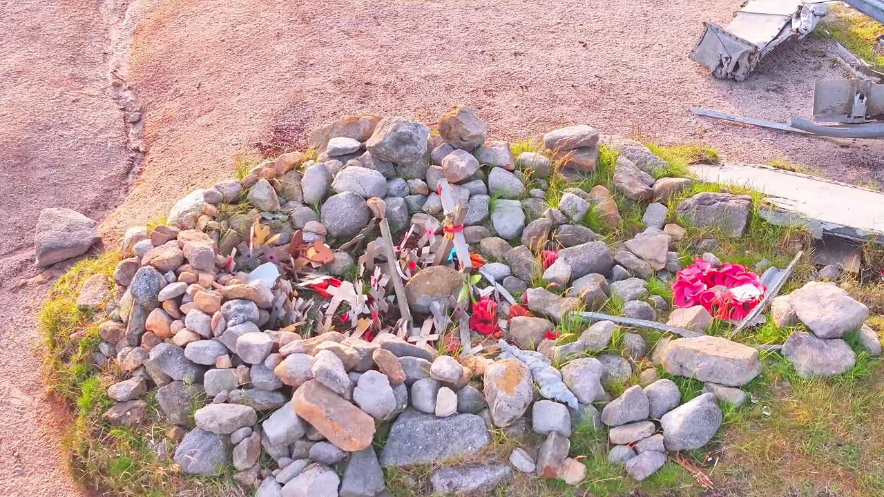 Aerial view of a stone memorial grave marking the B-29 Superfortress WWII plane crash site in the Peak District, England.