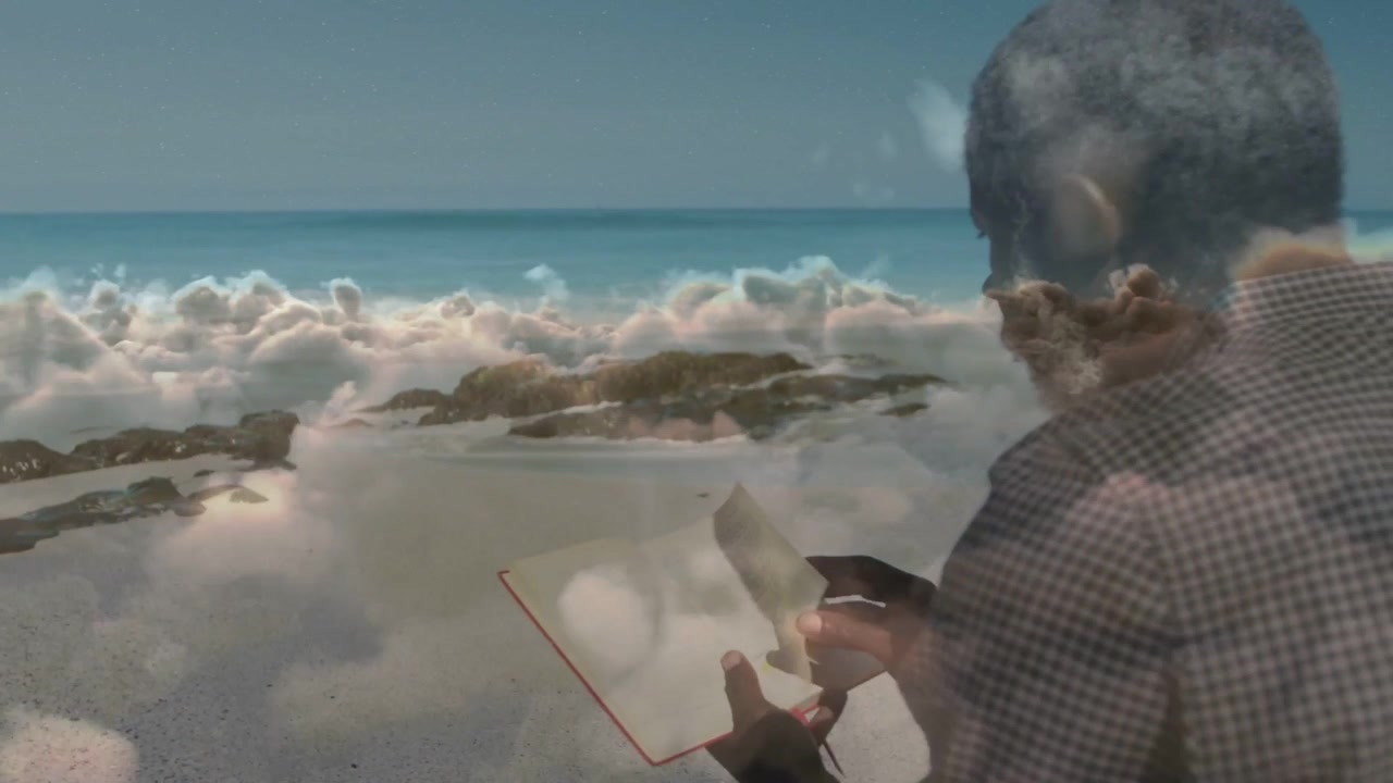 Mature man flipping pages with right hand at shoreline, cloud mist drifting across pages for design