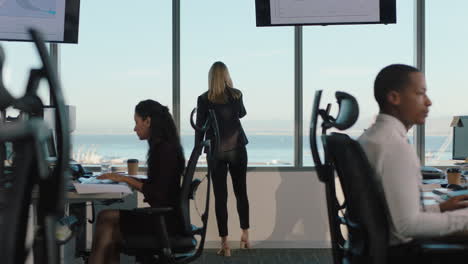 business-woman-using-smartphone-having-phone-call-chatting-to-client-on-mobile-phone-looking-out-window-female-executive-discussing-sales-in-busy-office