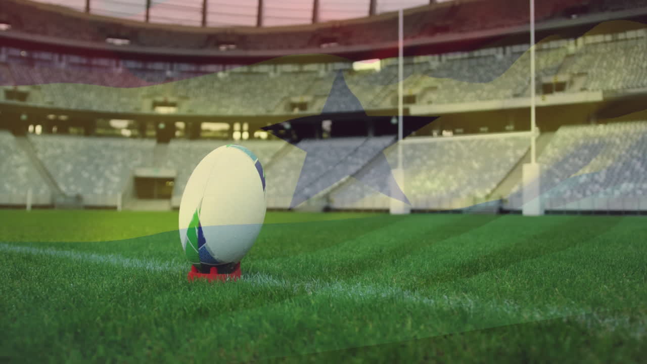 In stadium, animation of rugby ball on field with Ghana flag overlay