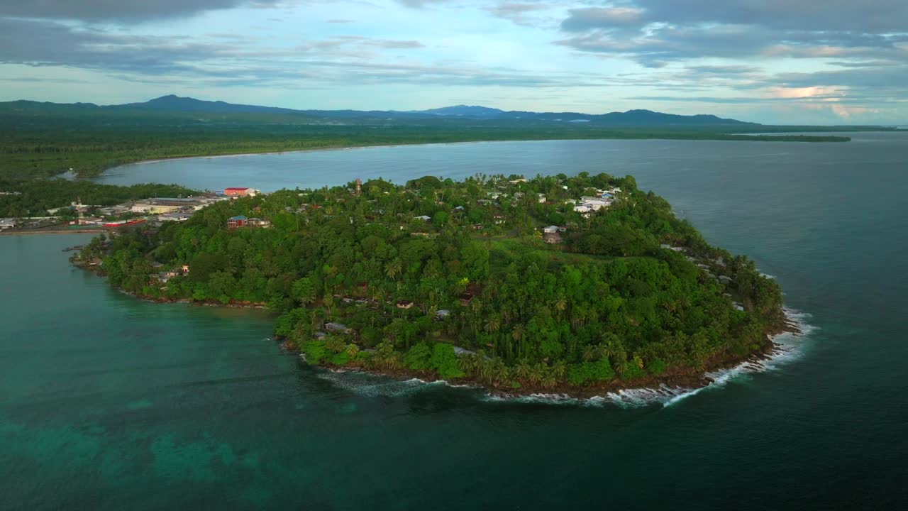 Wewak Hill Cape Wom peninsula morning summer dry season Wewak costal town aerial drone Papua New Guinea PNG panoramic ocean view Dogreto Bay Sundaun Market Boram Rd Inn Boutique Hotel down motion