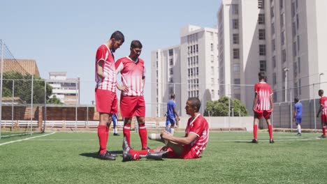 Soccer-player-with-prosthetic-leg-with-soccer-team