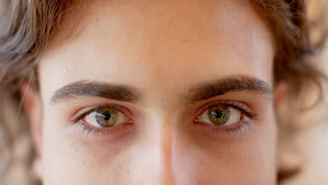 close-up of green eyes gazing intently, capturing moment of connection