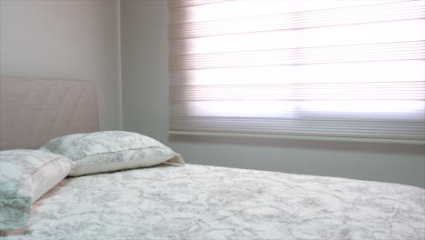 camera footage entering the room from the bedroom door