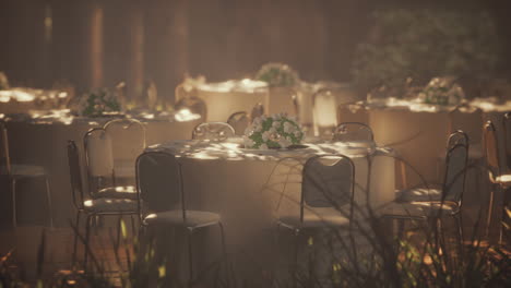 elegant outdoor wedding reception with white floral centerpieces