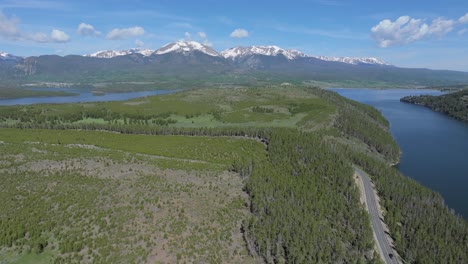 natural scenery of road around dillion reservoir and high mountains backdrop