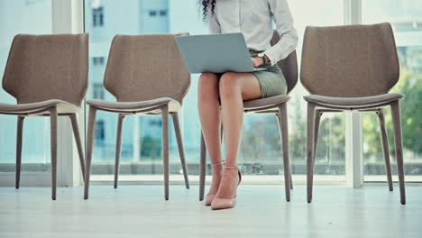 woman, legs or laptop in waiting room