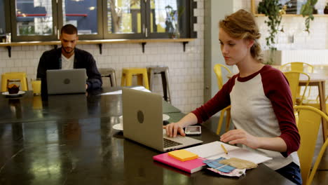 Female-executives-working-in-office-cafeteria-4k