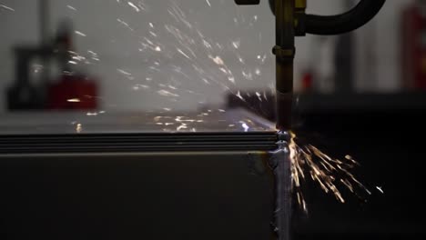 a detailed look into the welding process: showcasing the precision and technique involved in metal fabrication with sparks and equipment in action