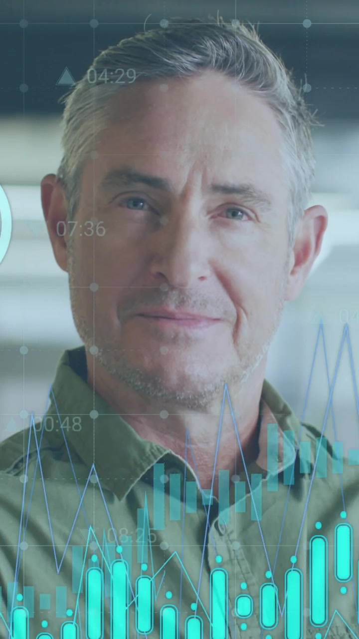 Animation of data processing with icons over caucasian businessman at office