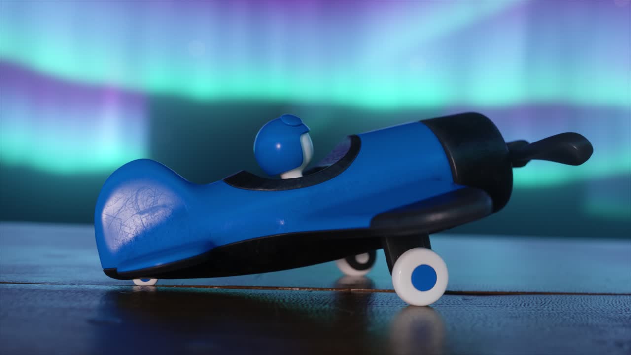 북쪽 불빛 앞 에 있는 장난감 비행기