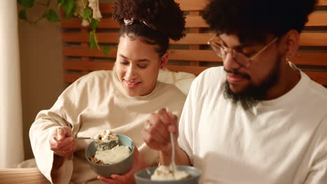 couple enjoying breakfast together at home