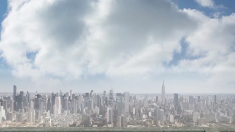 Distant-cityscape-with-modern-buildings-and-clouds-on-blue-sky