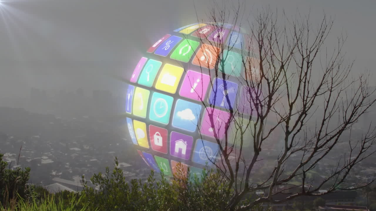 Animation of digital globe with colorful app icons over cityscape and tree