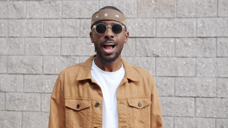 happy man in street style outfit