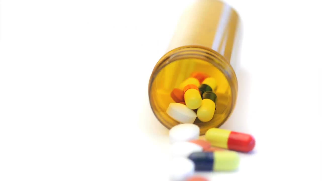 Open pill box rotating