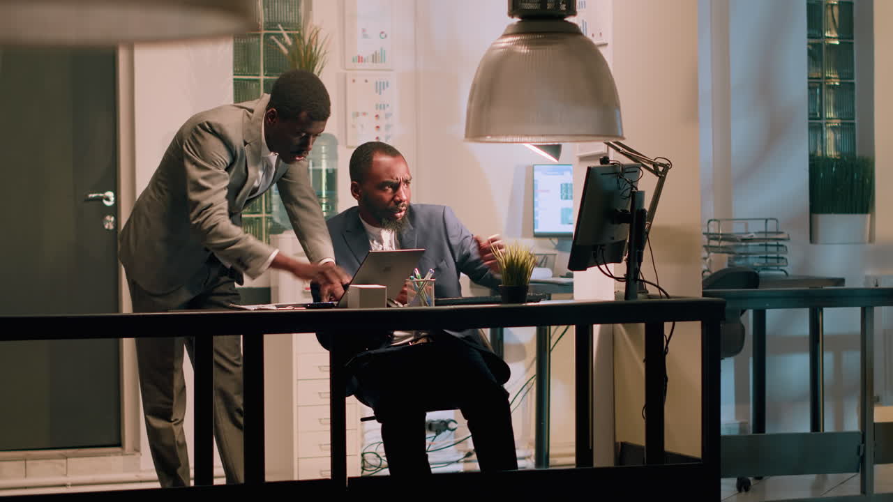 Businessmen collaborating in an office environment