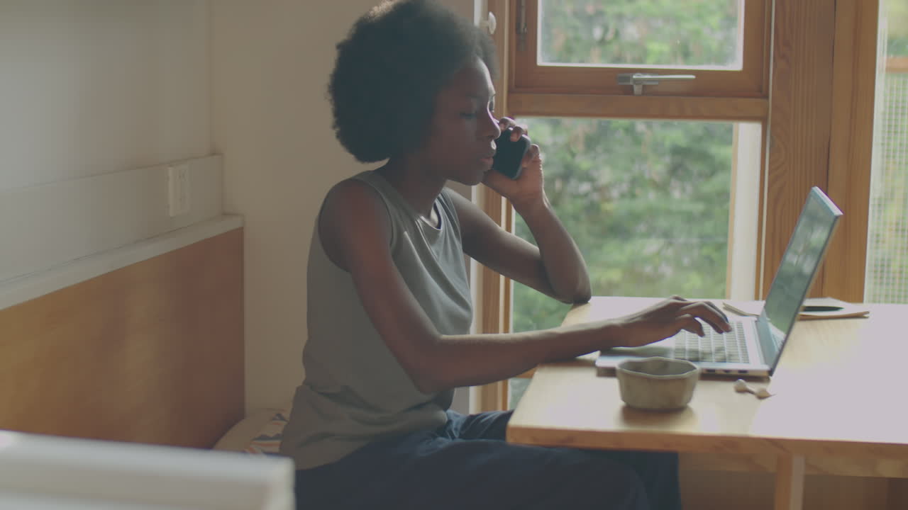 Black Woman Freelancing at Home