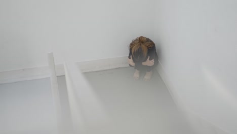a person in a corner