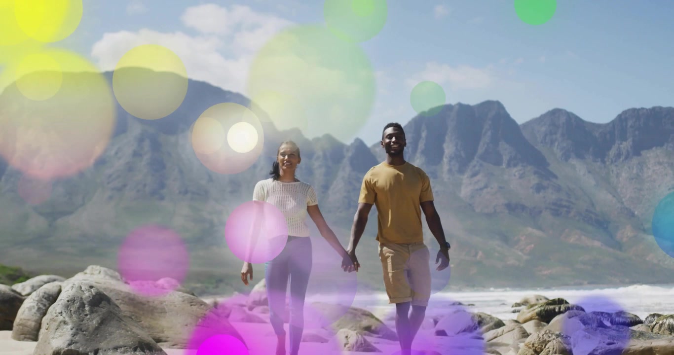 Circle overlays fading revealing couple holding hands walking by waves on beach for health