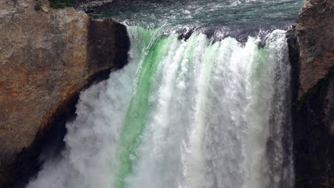 Close-up-of-water-cascading-over-the-brink-of-Yellowstone's-Lower-Falls