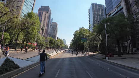 shot of several bikers in mexico city bike ride at sunday morning