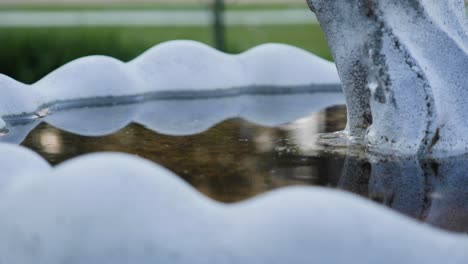 basin of a statue of an angel