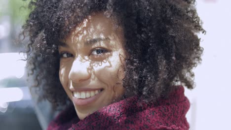 adorable young woman posing at camera