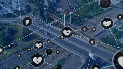 animation of network of connections with icons over cityscape and road traffic