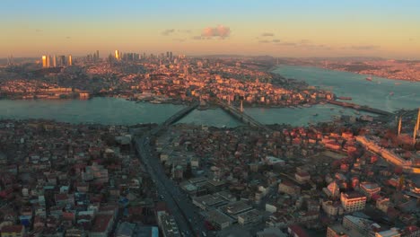 cityscape of istanbul at sunset - old mosque and view on golden horn and bosphorus in turkey. aerial view 4k.