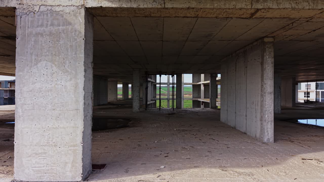 Abandoned building structure viewed from above during daylight