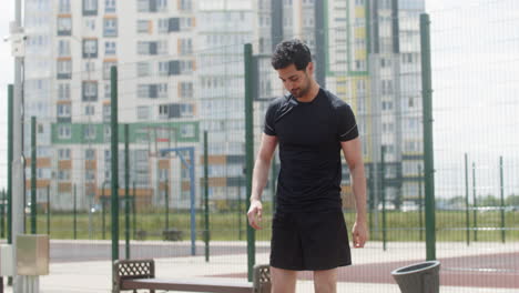 brunet man stretching