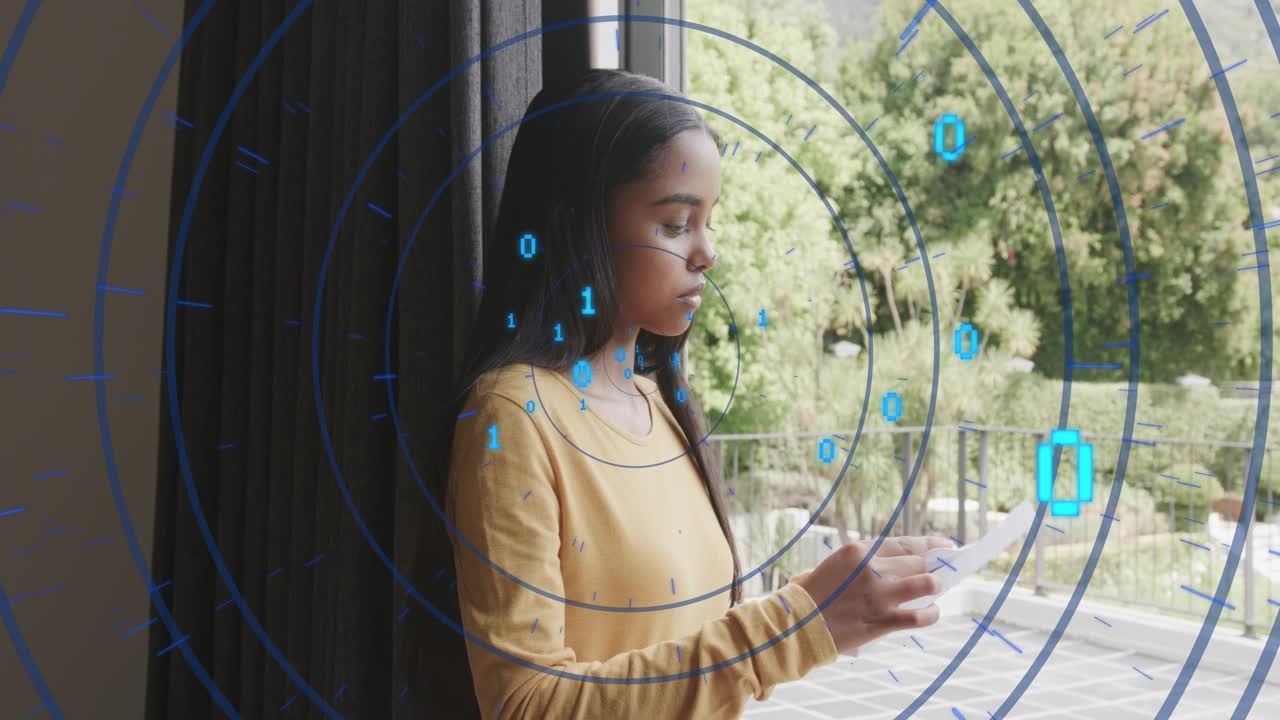 Woman at sliding door reading phone and reviewing papers glancing out tech overlay surrounding her