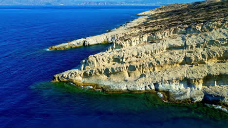 limestone cliffs on the rugged shore of rethymno region in crete, greece