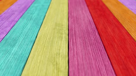 old wood plank rainbow background with depth of field. seamless loop 3d render