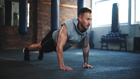 fitness, push up and challenge with man in gym