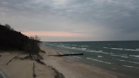 A-drone-rising-over-a-storm-in-the-distance