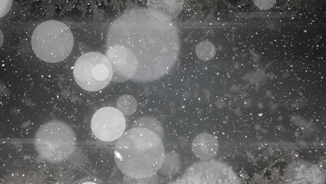 Animation-of-snow-falling-over-light-spots-on-black-background