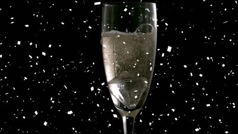 Animation-Von-Fallendem-Konfetti-Und-Strömendem-Champagner-In-Ein-Glas-Champagner-Auf-Schwarzem-Hintergrund