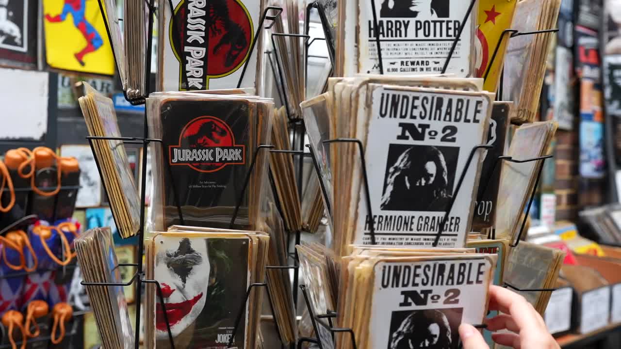 Film-themed plates on display at Portobello Road Market in Notting Hill, London, featuring iconic designs
