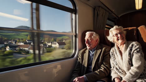 senior couple enjoying train journey