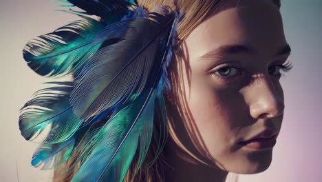 woman with vibrant blue and green feathers