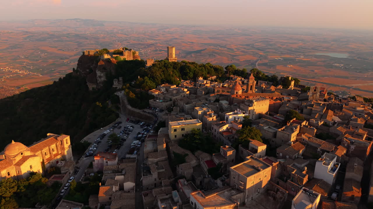 Erice Village Sunlit During Golden Hour In Sicily, Italy. - aeria shot