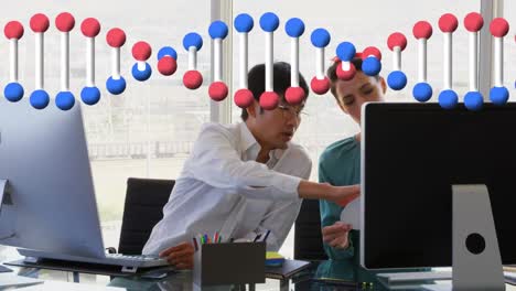 Animation-of-dna-strand-over-businessmen-using-computers