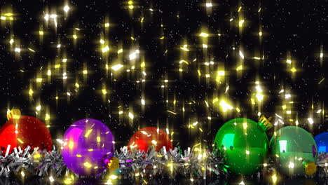 animation of glowing lights and christmas baubles on black background