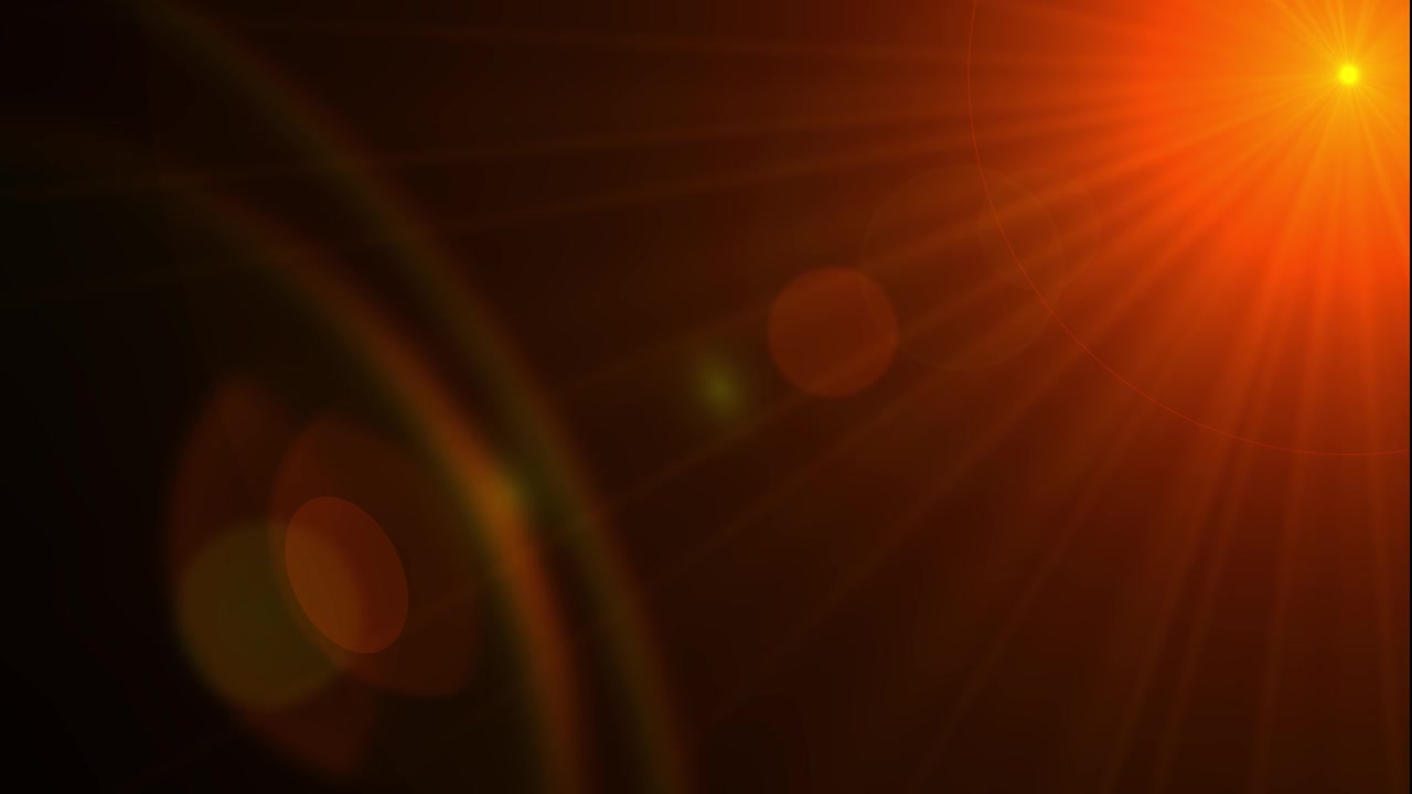 Bright Orange Lens Flare Effect on Dark Background