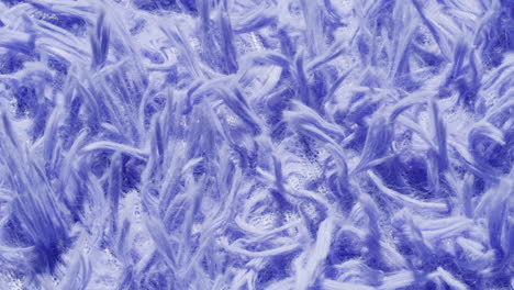 close-up of a textured purple fluffy fabric