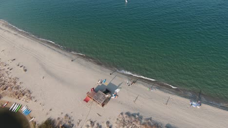 kids playing in the sand at the beach