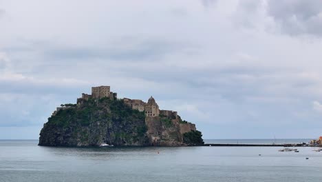 Medieval-Castello-Aragonese,-famous-castle-on-rocky-island-in-Ischia,-Italy